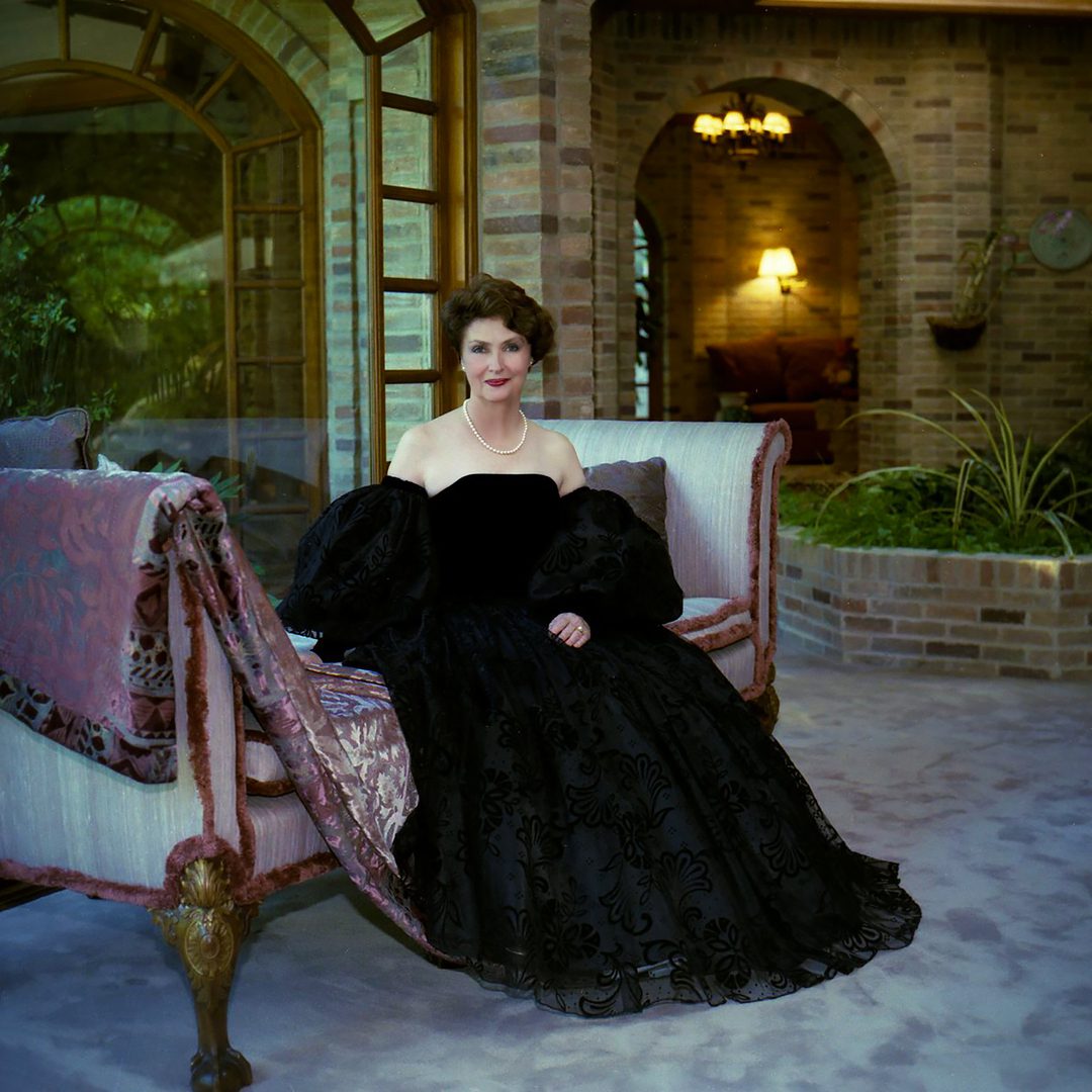 a woman in a black gown
